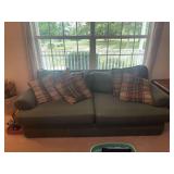 Alan White Green Upholstered Sofa with Plaid Accent Pillows
