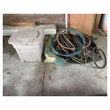 Suncast Hose Reel Enclosure with Assorted Garden Hoses