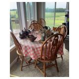 Round Oak Dining Table with Six Spindle Back Chairs