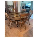 Oak Pedestal Dining Table with Five Cane Seat Chairs