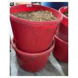 Red Plastic Storage Container with Wood Mulch