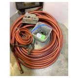 Garden Hose, Jumper Cables, and Decorative Sign