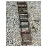 10 foot wood step ladder that is rated at 225 lbs. Good condition
