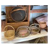 6 nice baskets with 2 of those that is bound in heavy copper- Pretty cool, and one Ratan storage chest
