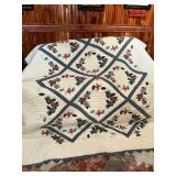 100" x 90" blue and white quilt with applique flowers & butterflies