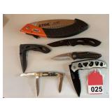Stihl compact saw, 3 folders, 1 large folder, and a Winchester 3 blade pocket knife