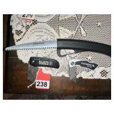 Klein and Lenox Gold folding box knives and a Fiskars sliding camp saw