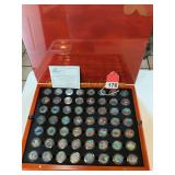 First Commerative Mint Statehood quarter set in wooden case with matching Quarters on reverse side