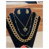 3 Gold necklaces and gold earrings