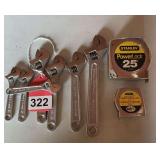 7 new adjustable wrenches and 2 new Stanley tapes
