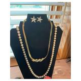 Gold and Diamond ribbon with pearl necklace and Star earrings