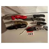 6 folding knives, and a Milwaukee folding box knife