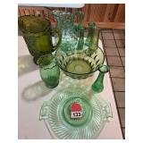 9 Pcs. of green glass, the dark green pitcher was made in 1965.