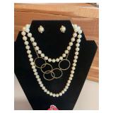 Large Pearl and Gold string of pearls with gold necklace and earrings