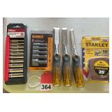 3 new Stanley wood chisels, New 25 ft. tape, 5 piece set of nut drivers, and a set of new ¼ inch sockets 11 piece.