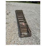 12 foot wood step ladder that is rated at 225 lbs. good shape