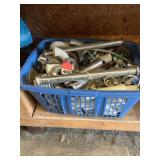 A basket full of PVC and Chrome traps, tail pieces, sink and disposal supplies and on and on.