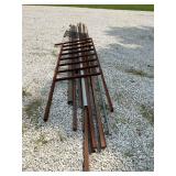 A large lot of steel, several feet of square tubing, rods, pipe of various sizes