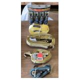 4 new 15 ft. ratchet straps, 1 tow strap (new) & 3 used ratchet straps, used