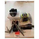 150 Lumen headlamp, Rock River Multi-Tool, Blackstone folder, Sheffield folder