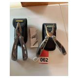 1 Stanley and 1 New Holland multitool with sheaths