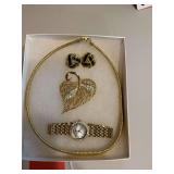Gold choker necklace + earrings + heart shaped pin with a watch