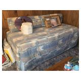 Daybed with Quilted Blue and Tan Patterned Upholstery and Back Cushions