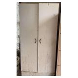 Metal cabinet with contents