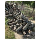 Large pile of assorted seasoned firewood