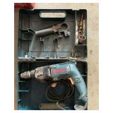 Bosch drill with handle and carrying case
