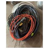 Assorted extension cords, hoses, and cabling
