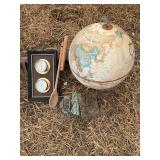 Globe, thermometer, small shelf, and book ends