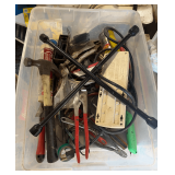 Tote of assorted tools - pliers, hammer, 4 way and more
