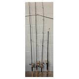 Four Fishing Poles & Reels