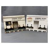 Two Vintage Camel Tire Patch Cabinets