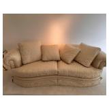 Upholstered Champagne Pillowback Crescent Sofa (2)