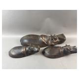 Submerged Hippopotamus Sculptures