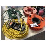 EXT. CORDS - CAMPING SUPPLIES - TORCH
