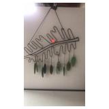Leaf motif. Metal wi/ sea glass (?)  Sun catcher.