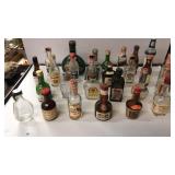 Lot of shot sized / airline size liquor bottles.