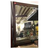 Wood framed mirror.  25x31? approx.  
old.