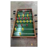 Tabletop foosball game.  No ball.