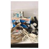 Lot of extension cords & lightbulbs.