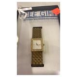 Watch.  Gold tone.  Rhinestone.