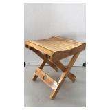 Wood stool. Folds.  11in sq top x 12in high