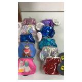 10 kiss lock coin purses.
