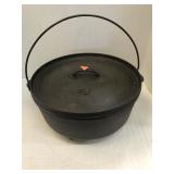 Cast Iron Dutch Oven.  12.  (quarts?) w/ handle &