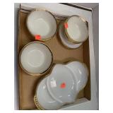 Gold colored rim glassware.  Seven small bowls,