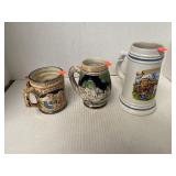 Three ceramic steins