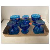 Six blue glass dessert cups